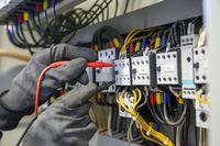 electrical-engineer-using-digital-meter-checking-electric-current-voltage-circuit-breaker